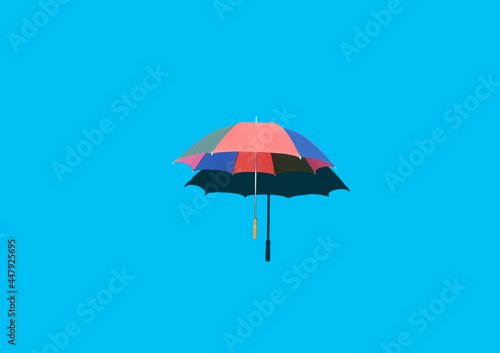 Top view, Single rainbow umbrella isolated on cyan background for stock photo or design, invesment, business, summer concept