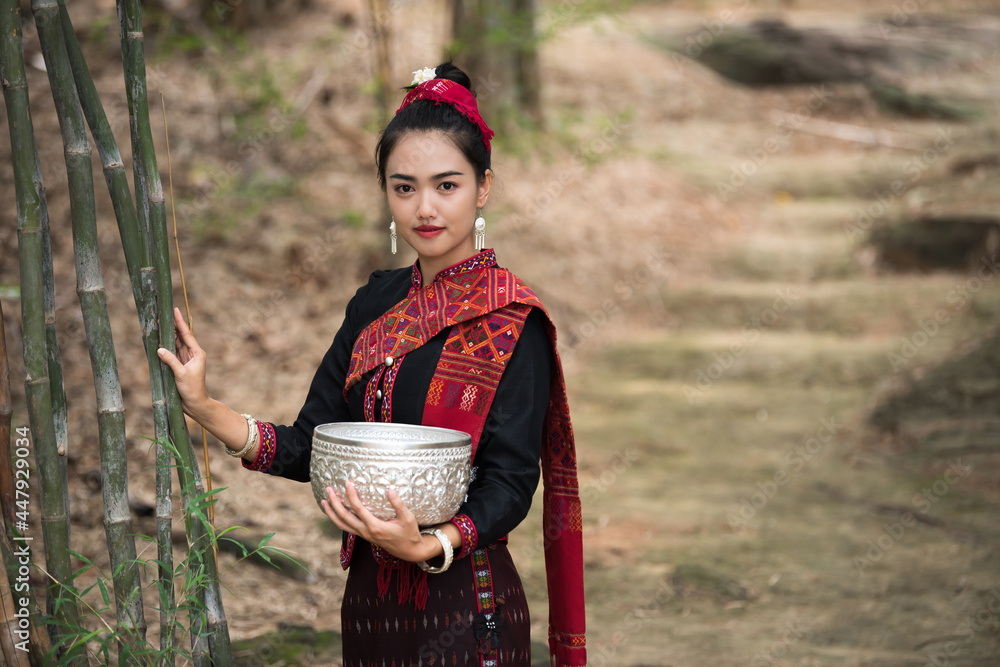 Beautiful Thai girls with local traditional costumes at the traditional festival