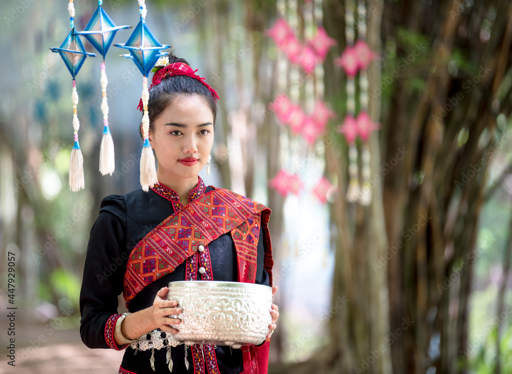 Beautiful Thai girls with local traditional costumes at the traditional ...