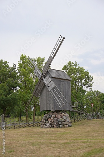 Old wooden millhouse in Saaremaa, Estonia, windmill in Angla town. photo