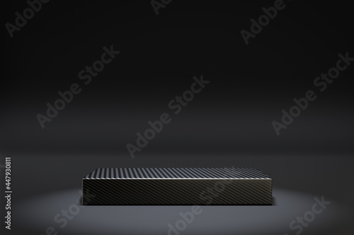 Cosmetic display product stand. Kevlar texture stand black block podium on dark background. 3D rendering illustration