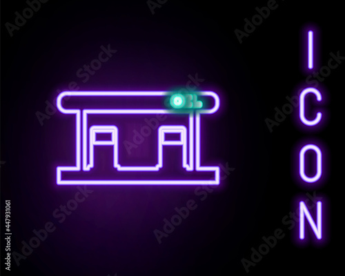 Glowing neon line Gas filling station icon isolated on black background. Transport related service building Gasoline and oil station. Colorful outline concept. Vector