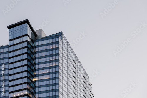 Photography Modern abstract office building high rise skyscraper design in the city with gla