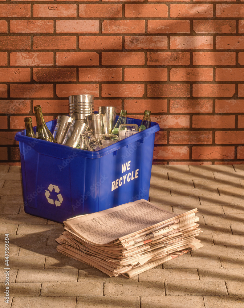 An early morning shot of recycled cans, glass bottles, plastic