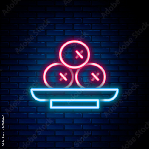 Glowing neon line Olives on plate icon isolated on brick wall background. Colorful outline concept. Vector