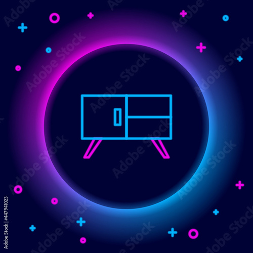 Glowing neon line Chest of drawers icon isolated on black background. Colorful outline concept. Vector