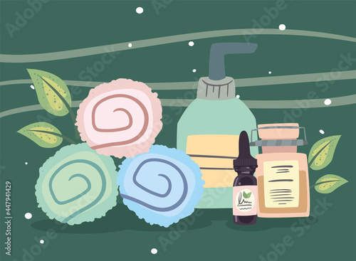 Spa center towels bottle jar and dropper
