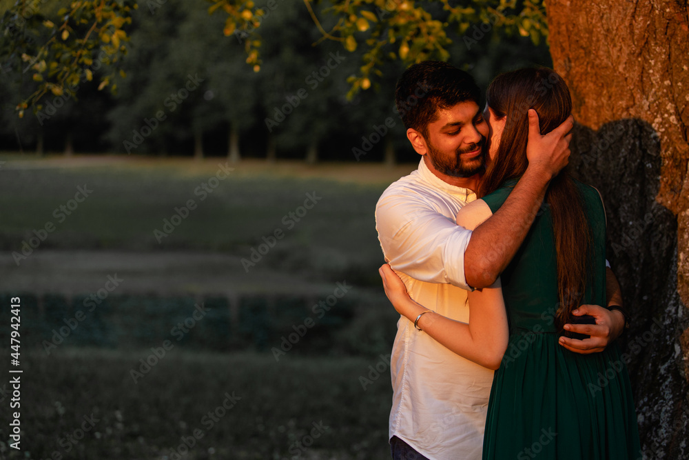 love story of young hindu guy and european beautiful girl at dawn