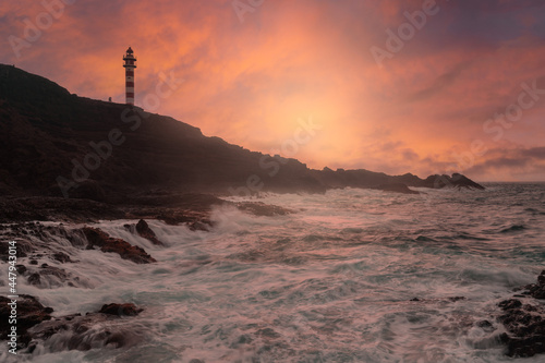 Seascape. Sardina del Norte Lighthouse at sunset. Galdar. Canary Islands