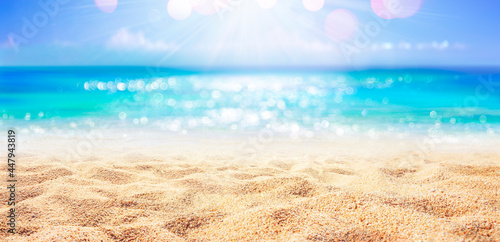 Fototapeta Naklejka Na Ścianę i Meble -  Beach - Sand With Abstract And Defocused Ocean In Background