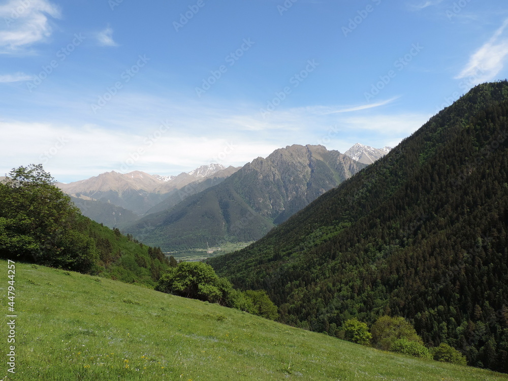 Mountain landscape in summer. Mountains in summer without snow, blue sky on a clear day.