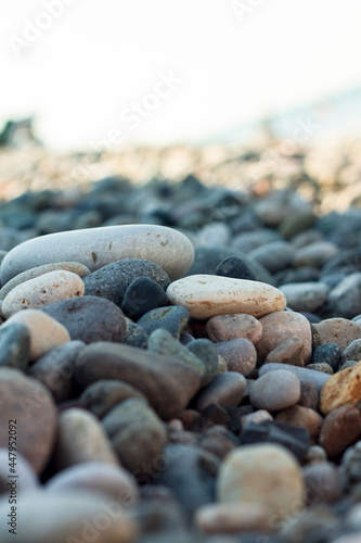 Texture of multi-colored stones on the black sea coast