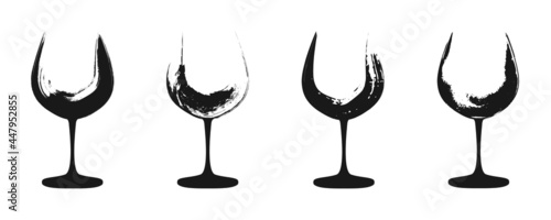 Set of black grunge wine glasses icons isolated on a white background.