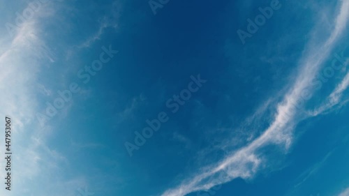 White clouds on turquoise sky at sunset