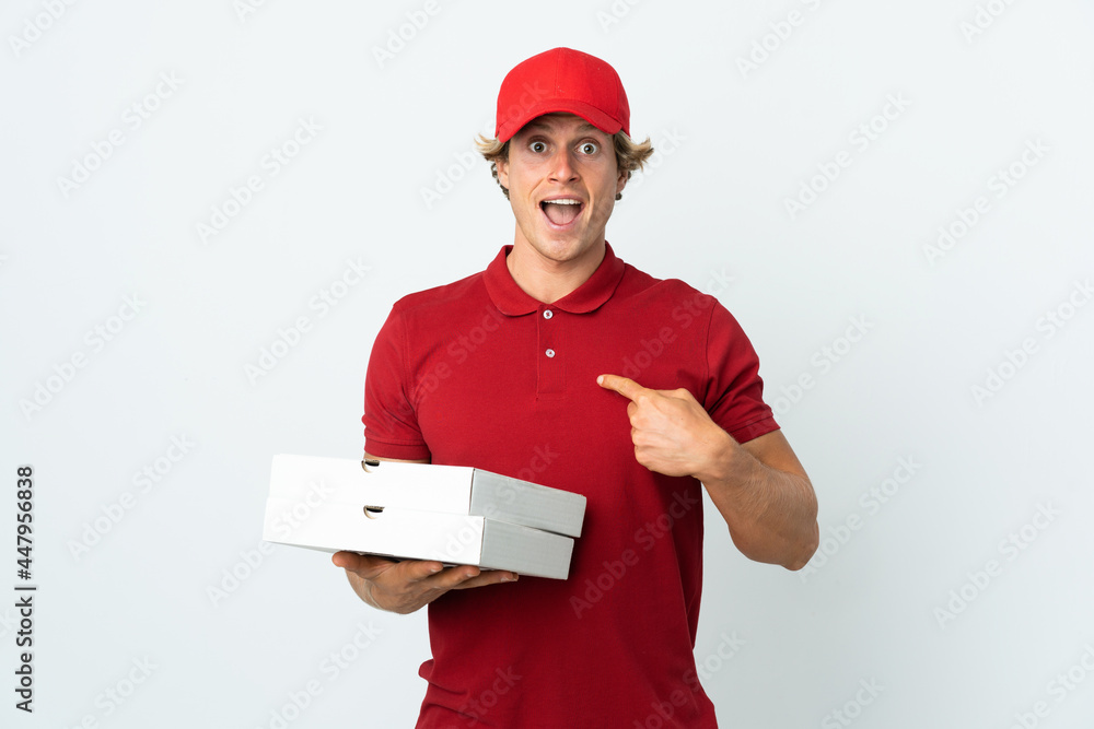 pizza delivery man over isolated white background with surprise facial expression pizza delivery man over isolated white background with surprise facial expression