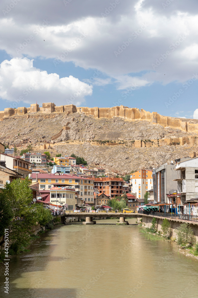 In the city center of Bayburt, the flowing Çoruh river and the view of Bayburt Castle on the hill, 17 July 2021, Bayburt, Turkey
