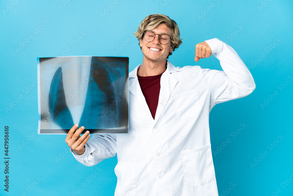 Professional traumatologist man doing strong gesture Professional traumatologist man doing strong gesture