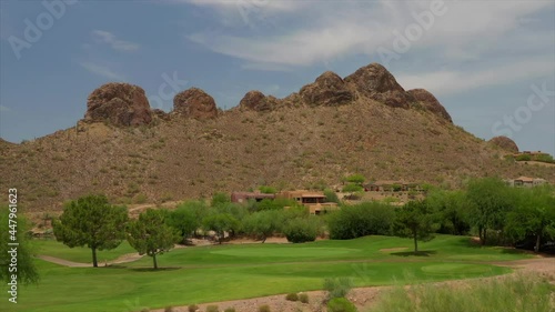 A high definition aerial view of a desert golf course located in the American southwest. photo