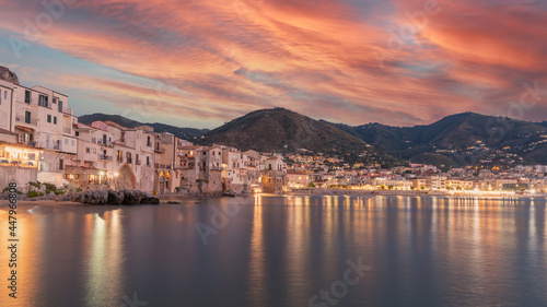 Old building on beach in Cefalu at night. Sicily stock photo. Cityscape, Sicily, Cefalu, Europe, Beach