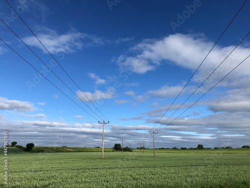 Photos Power lines across farmland in North Yorkshire, England, United Kingdom