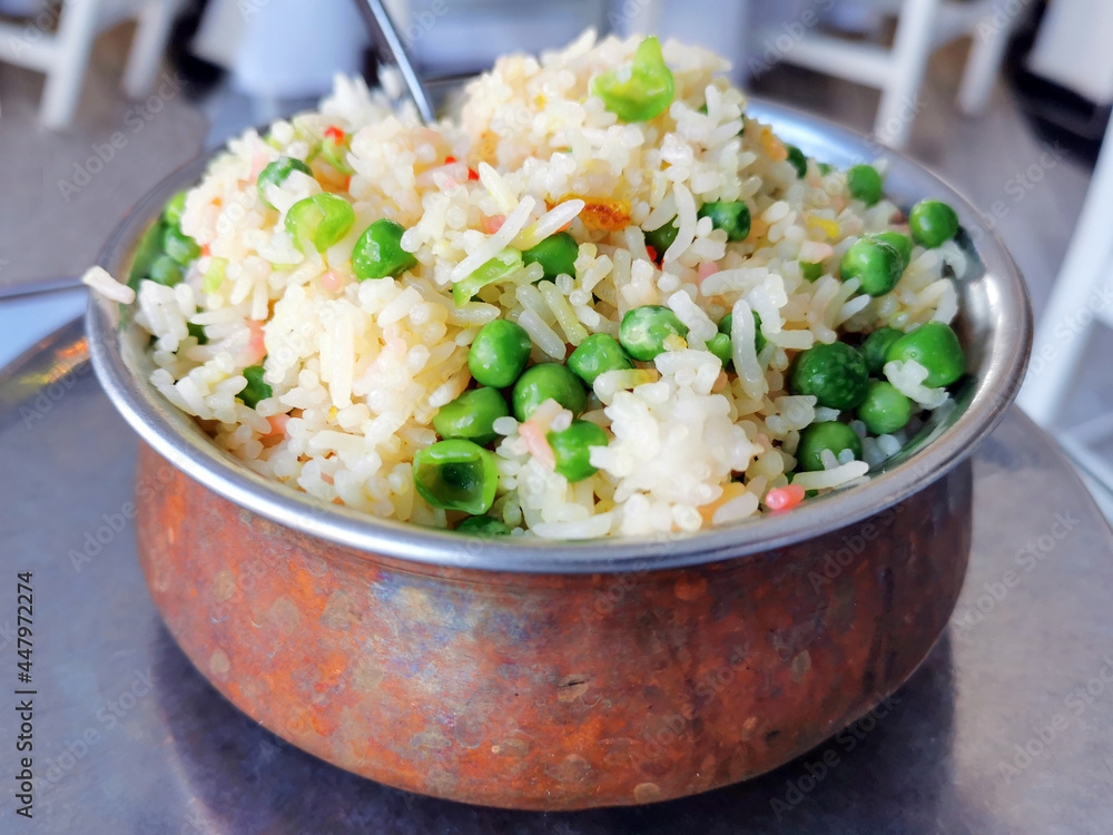 Peas Pulao or Matar Pulao in a copper bowl. One pot rice dish. Fried ...