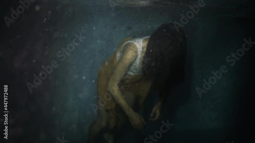 Woman floats inert at night