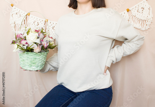 Blank sweatshirt mock up. Female wear plain hoodie mockup with flowers.
