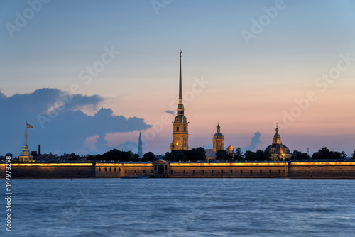 Peter and Paul (Petropavlovskaya) Fortress (build in 1740) on the Hare Island on the Neva river in Saint Petersburg, Russia during the white nights photo