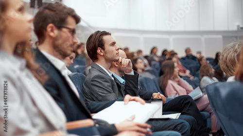 young business people listening to a lecture in the conference hall. photo