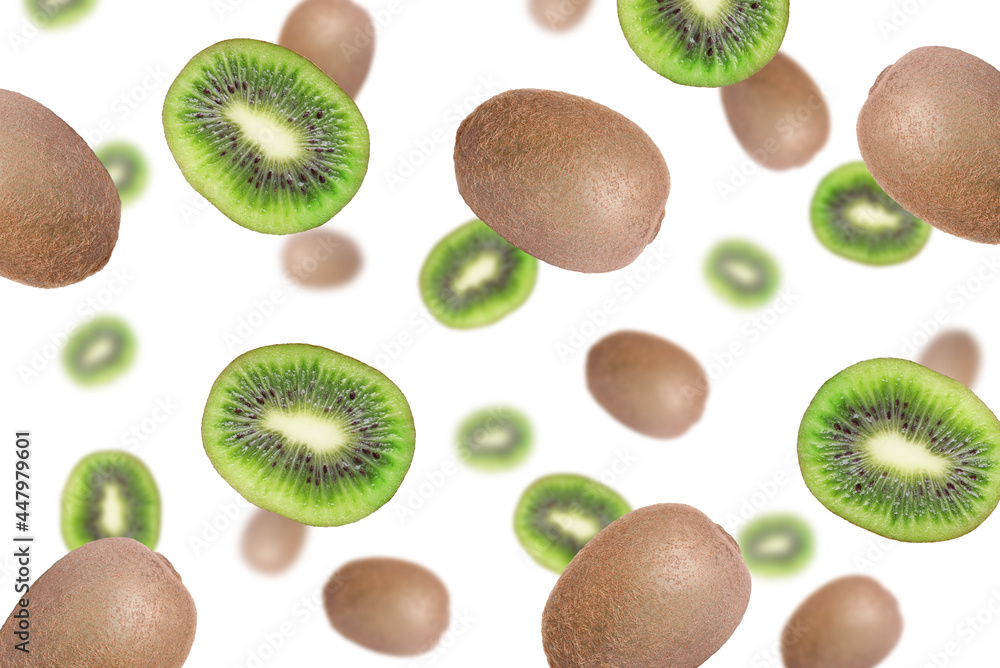 Fototapeta premium Delicious exotic kiwi fruits flying on white background