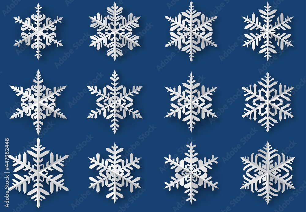 Set of beautiful complex paper Christmas snowflakes with soft shadows, white on blue background Set of beautiful complex paper Christmas snowflakes with soft shadows, white on blue background