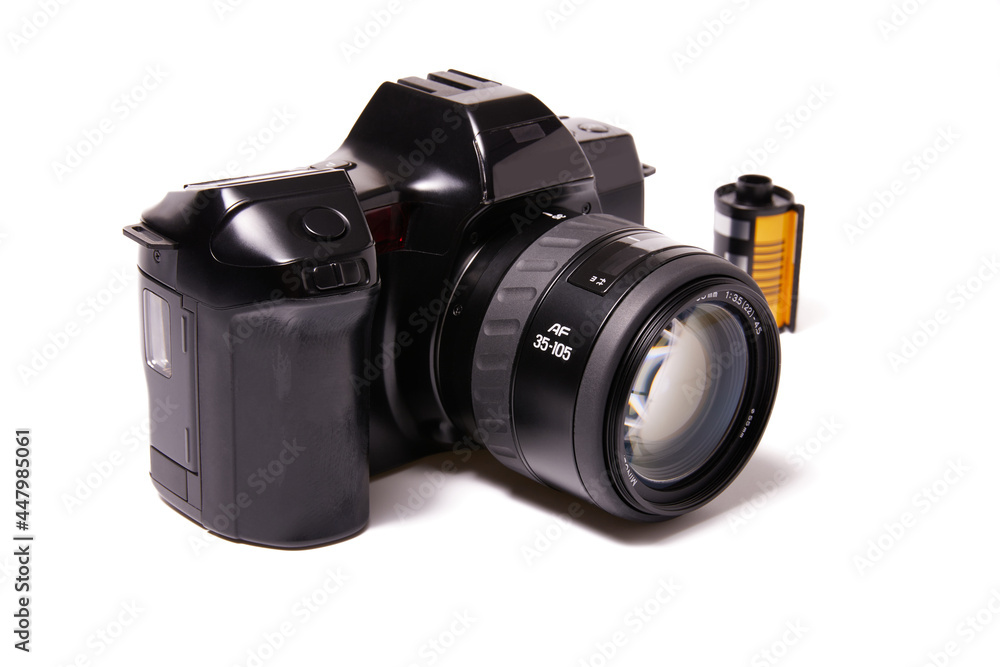 Fototapeta premium Analog black camera with 35mm photo reel