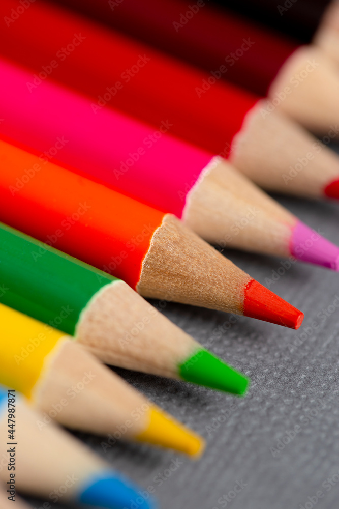 Set of Rainbow Colored Pencils on a Gray Background Set of Rainbow Colored Pencils on a Gray Background