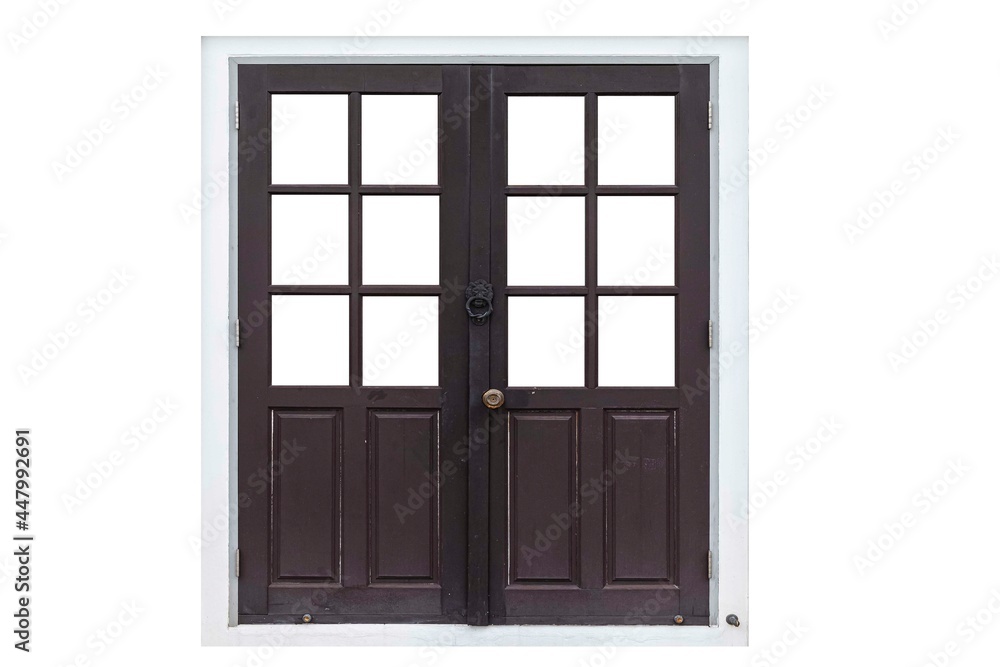 A large dark brown wooden door isolated on a white background A large dark brown wooden door isolated on a white background