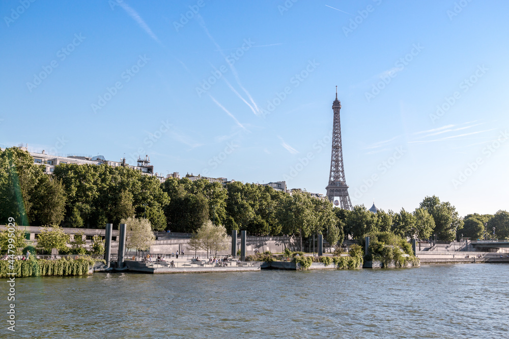 river seine in paris with the eiffel tower in the background