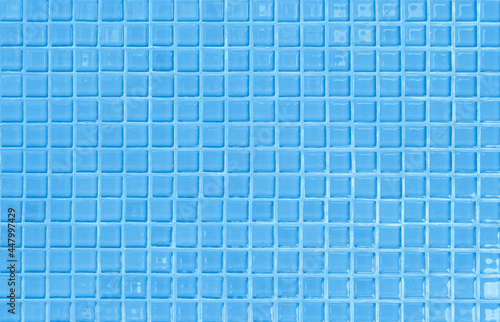 Blue pastel ceramic wall and floor tiles abstract background. Design geometric mosaic texture.