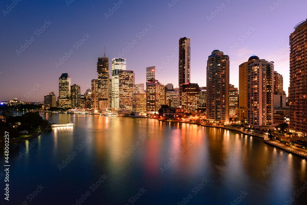 Fototapeta premium Brisbane city buildings and river seen in early morning light from Kangaroo Point. Brisbane is the state capital of Queensland, Australia.