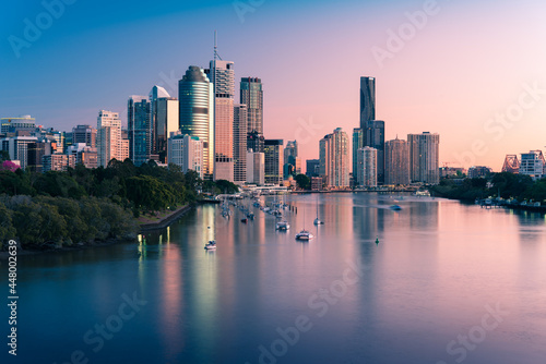 Brisbane city buildings and river seen in early morning light from Kangaroo Point. Brisbane is the state capital of Queensland  Australia.