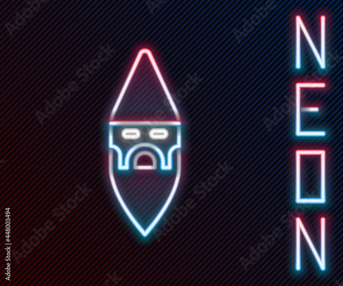 Glowing neon line Wizard warlock icon isolated on black background. Colorful outline concept. Vector