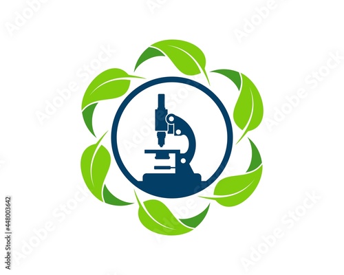 Circular nature leaf with circle shape and microscope laboratory inside