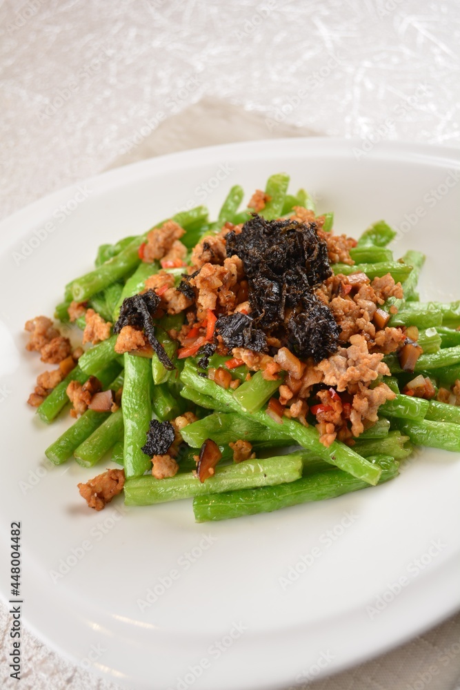 stir fried green long bean vegetables with mini shrimp paste and garlic in white background asian halal vegan menu stir fried green long bean vegetables with mini shrimp paste and garlic in white background asian halal vegan menu