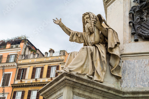 Seer Ezekiel Statue at the base of  the Colonna della Immacolata (Column of the Immaculate Conception) in Piazza Mignanelli, Rome, Italy photo