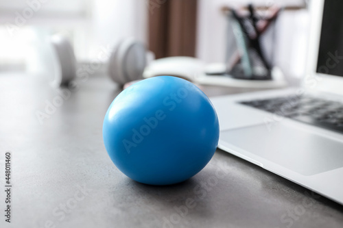 Stress ball on table in office