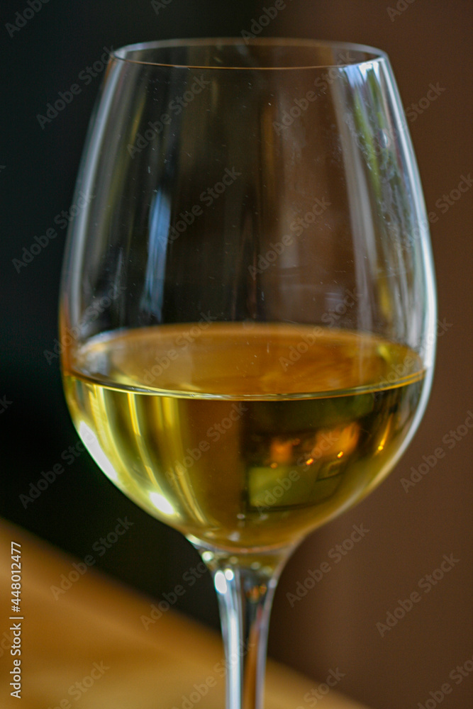 Golden wine in glass