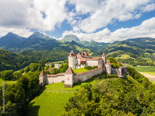 The aerial image of the medieval Gruyeres Castle on the hill top of Alps. It is one of the most popular tourist destionations. © Yü Lan