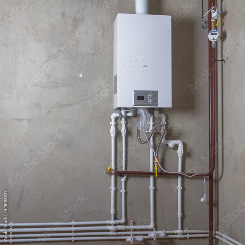 Double-circuit gas boiler in a new house for winter heating and water heating