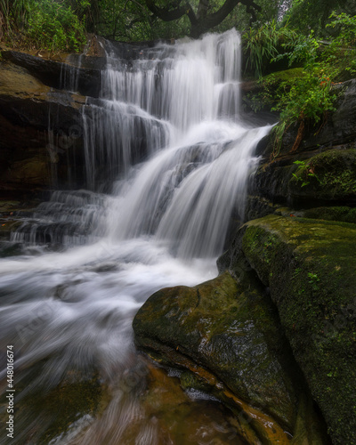 Fototapeta Naklejka Na Ścianę i Meble -  rocks in the forest with a waterfall