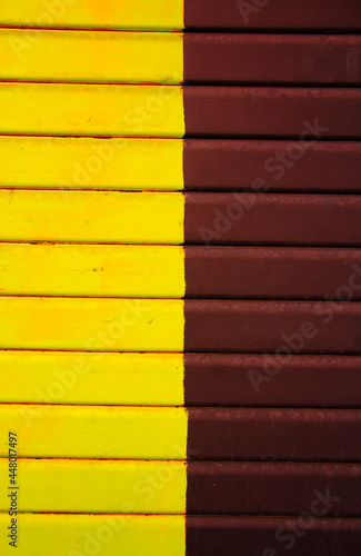 Background of brown and yellow boards. Textures. Background.