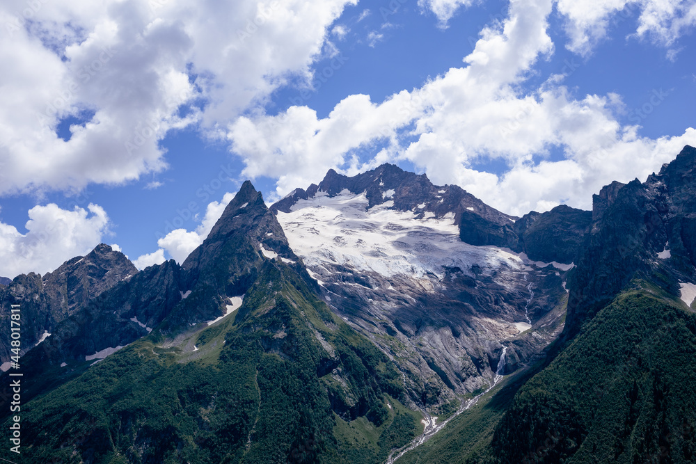 Mountain peaks in summer. Dombay, July 2021 Mountain peaks in summer. Dombay, July 2021