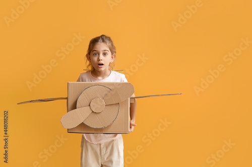 Shocked little girl with ca...